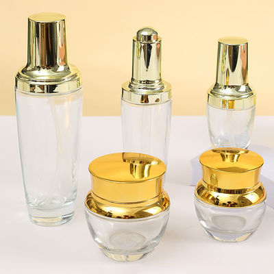 Printing Handling Decoration Firing 100ml Glass Spray Bottle for Body Oil Economical Custom Logo Design Golden Glass Bottles